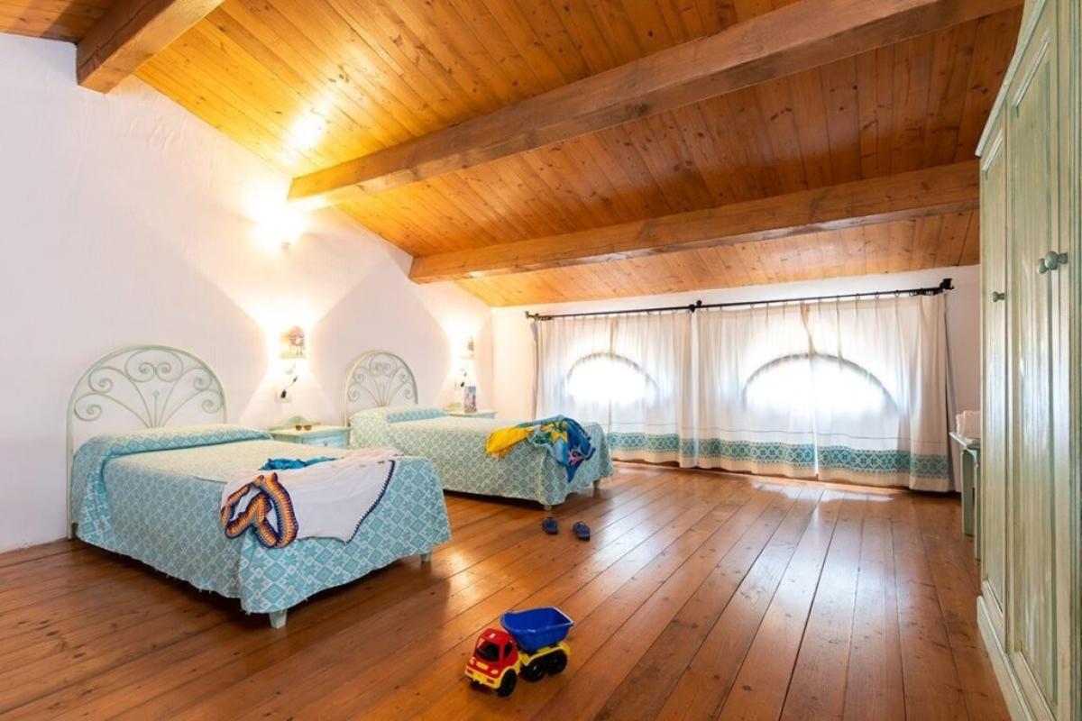 Nexus Hotels di Bini Viaggi S.R.L. Li Suari Club Village San Teodoro -  Sistemazione Familia 1