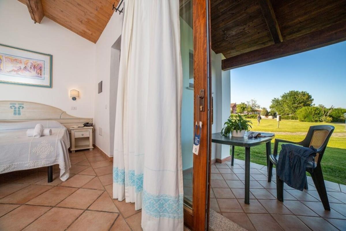 Nexus Hotels di Bini Viaggi S.R.L. Li Suari Club Village San Teodoro -  Sistemazione Familia 1