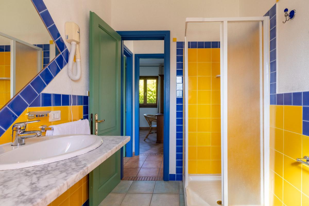 Nexus Hotels di Bini Viaggi S.R.L. Appartamenti Vecchio Stazzo San Teodoro -  Sistemazione Trilo 6 1