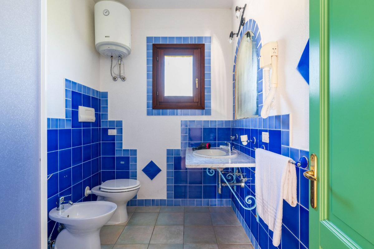 Nexus Hotels di Bini Viaggi S.R.L. Appartamenti Vecchio Stazzo San Teodoro -  Sistemazione Trilo 6 DS 1