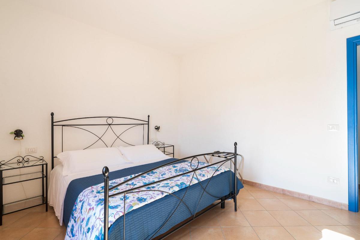 Nexus Hotels di Bini Viaggi S.R.L. Appartamenti Vecchio Stazzo San Teodoro -  Sistemazione Trilo 6 DS 1