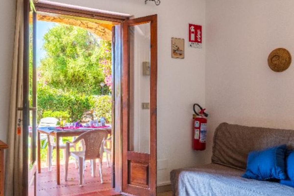 Nexus Hotels di Bini Viaggi S.R.L. Residence Oasi e Oasi Blu San Teodoro - Sistemazione Bilo 4 1