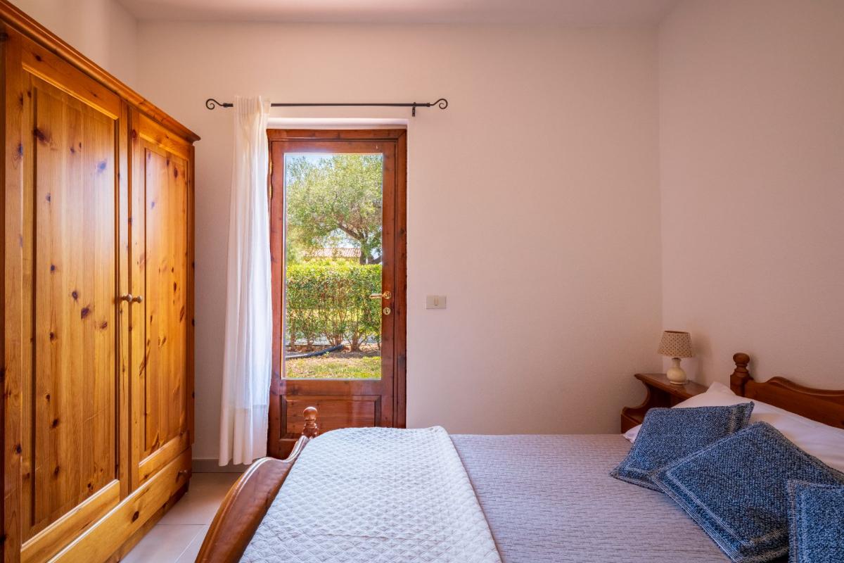 Nexus Hotels di Bini Viaggi S.R.L. Residence Oasi e Oasi Blu San Teodoro -  Sistemazione Trilo 6 1