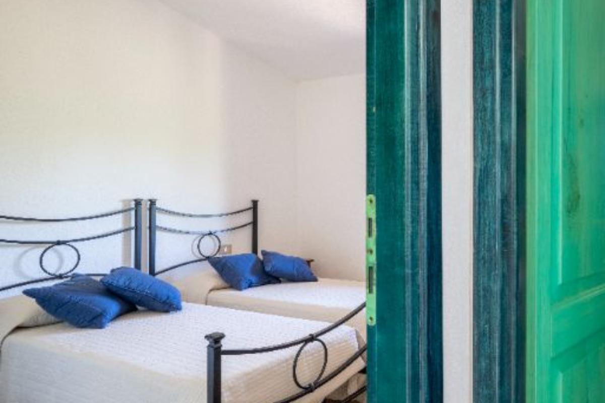 Nexus Hotels di Bini Viaggi S.R.L. Residence Oasi e Oasi Blu San Teodoro - Sistemazione Trilo 4 BLU 1