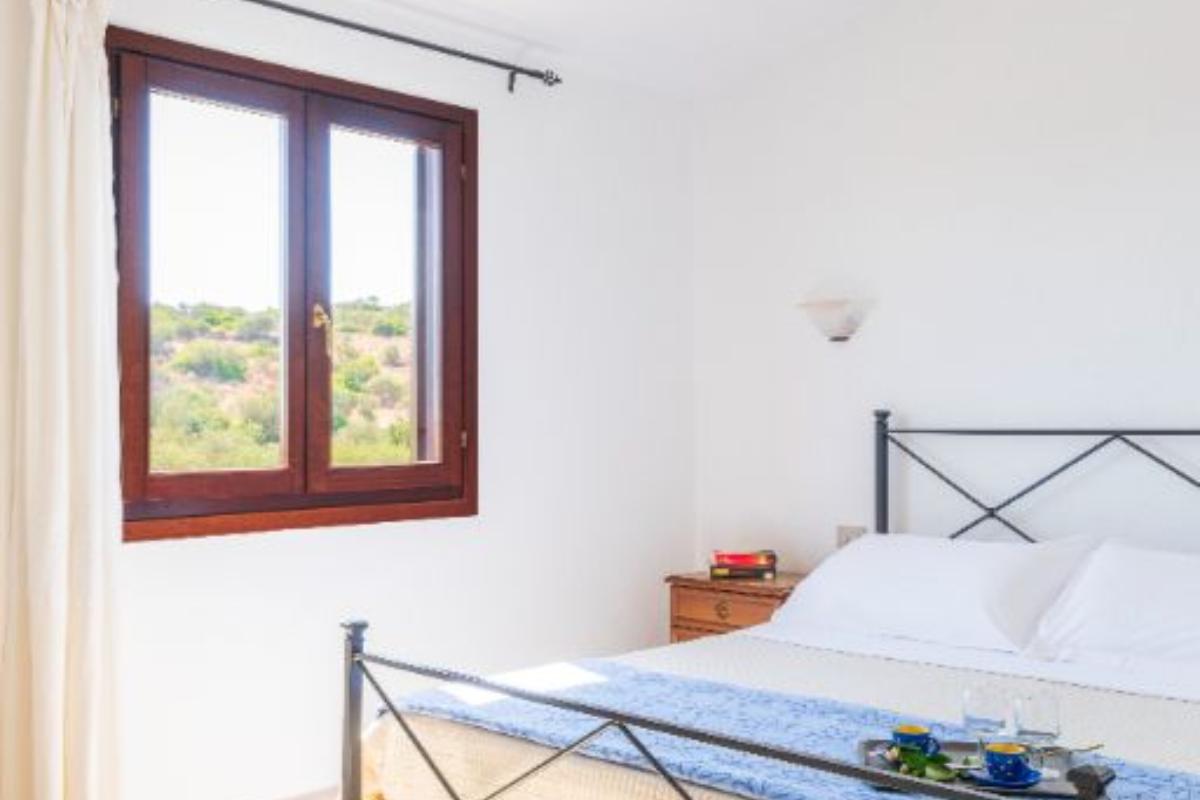 Nexus Hotels di Bini Viaggi S.R.L. Residence Oasi e Oasi Blu San Teodoro - Sistemazione Trilo 4 BLU 1