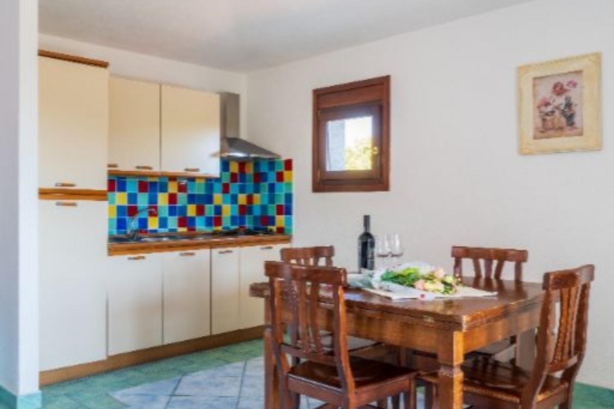 Nexus Hotels di Bini Viaggi S.R.L. Residence Oasi e Oasi Blu San Teodoro - Sistemazione Trilo 4 BLU 1