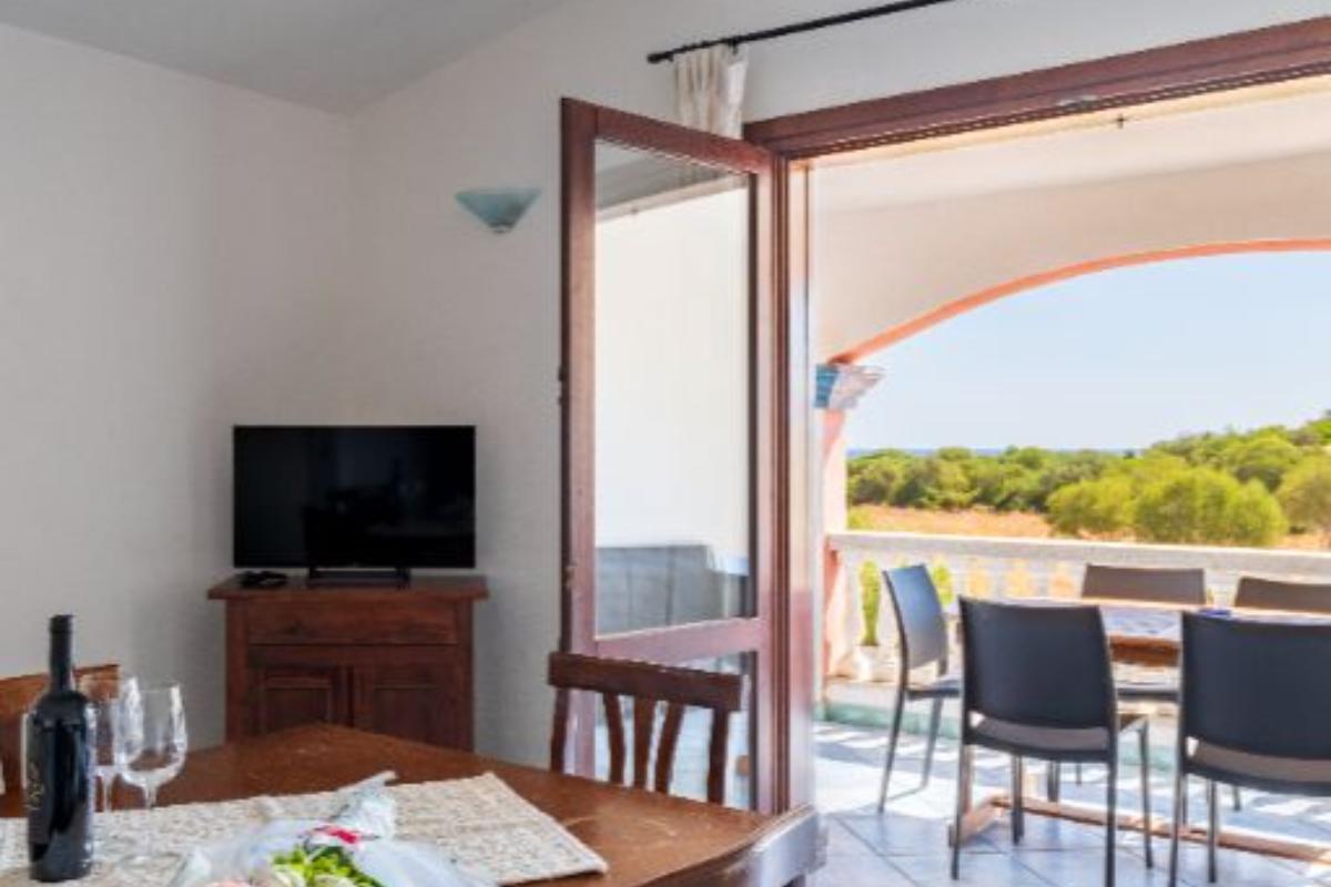 Nexus Hotels di Bini Viaggi S.R.L. Residence Oasi e Oasi Blu San Teodoro - Sistemazione Trilo 4 BLU 1