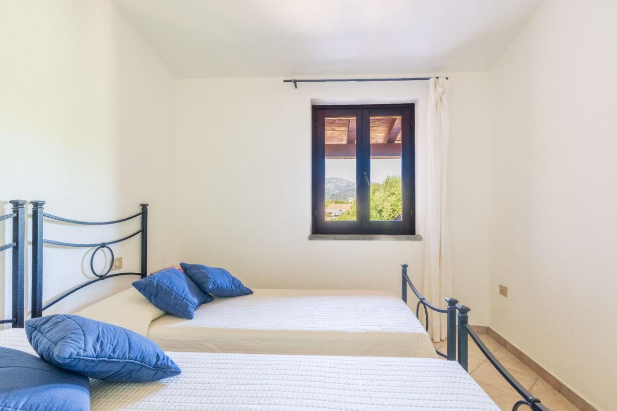 Nexus Hotels di Bini Viaggi S.R.L. Residence Oasi e Oasi Blu San Teodoro -  Sistemazione Trilo 4 BLU 1