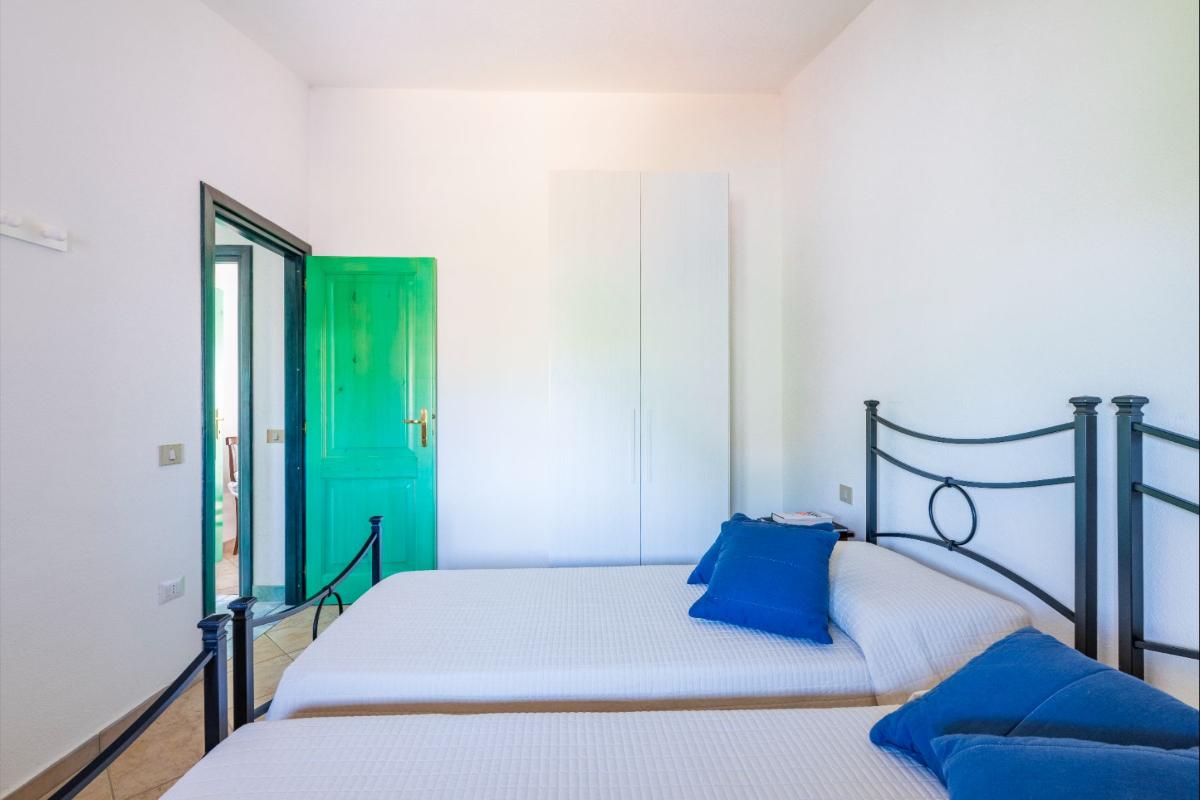 Nexus Hotels di Bini Viaggi S.R.L. Residence Oasi e Oasi Blu San Teodoro -  Sistemazione Trilo 4 BLU 1