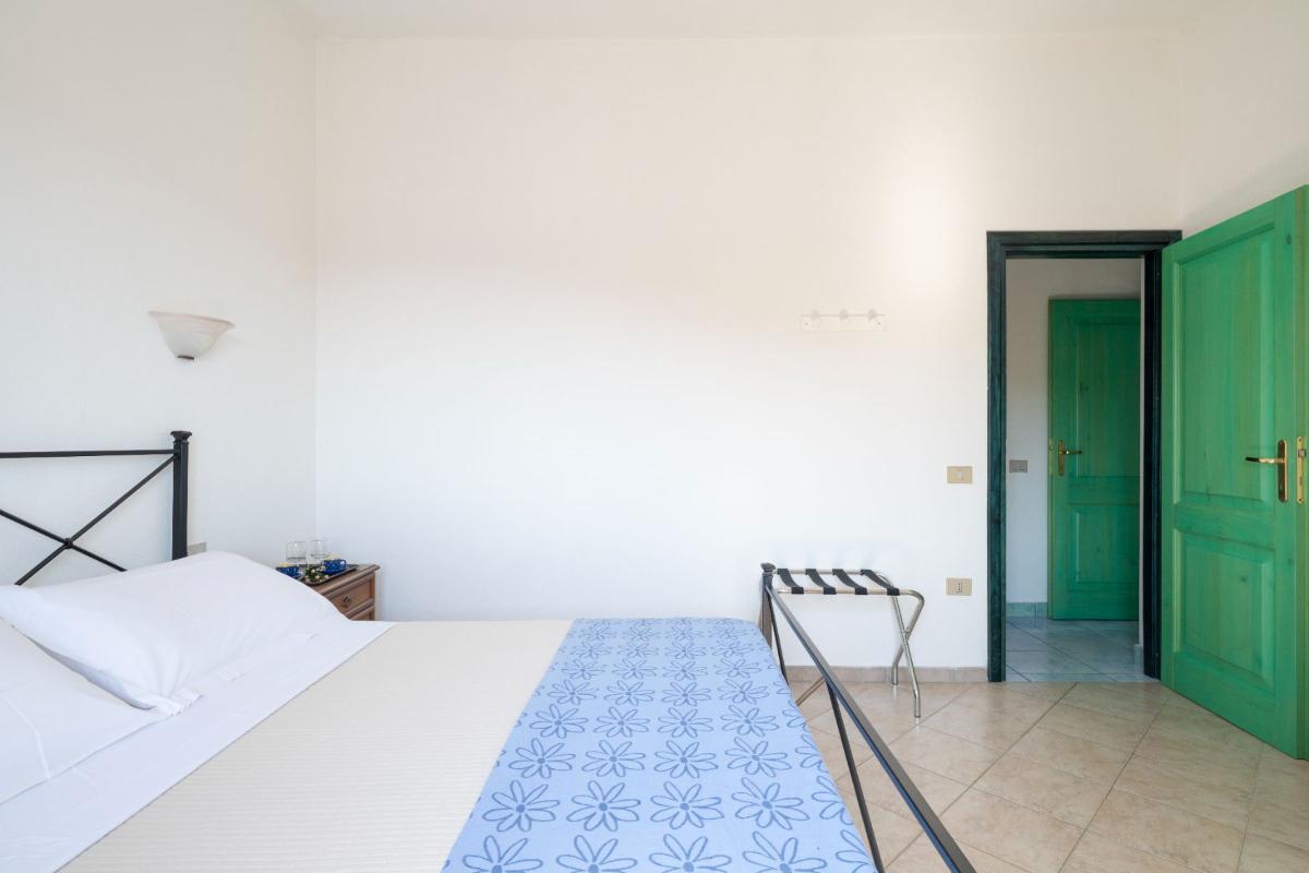 Nexus Hotels di Bini Viaggi S.R.L. Residence Oasi e Oasi Blu San Teodoro -  Sistemazione Trilo 4 BLU 1