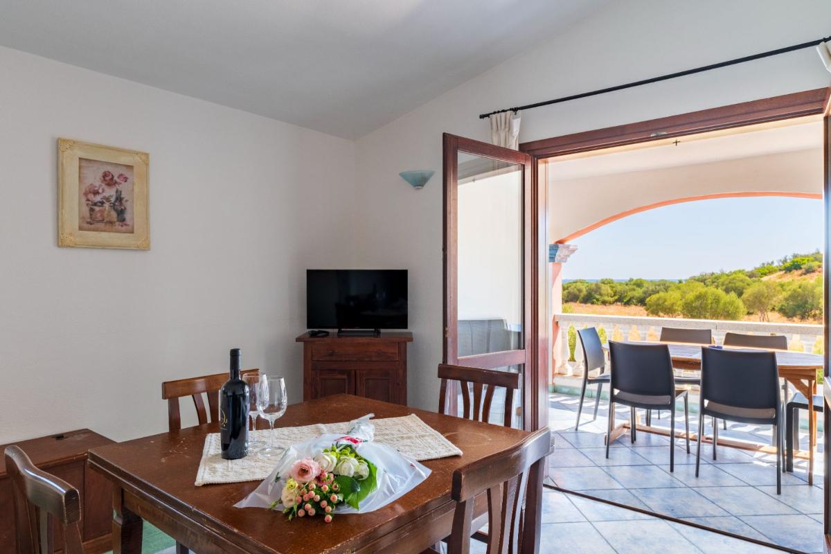 Nexus Hotels di Bini Viaggi S.R.L. Residence Oasi e Oasi Blu San Teodoro -  Sistemazione Trilo 4 BLU 1