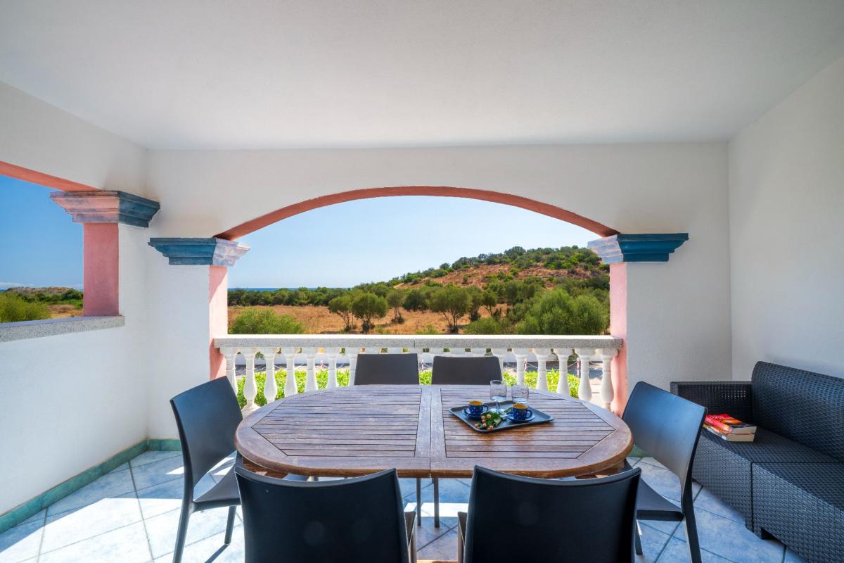 Nexus Hotels di Bini Viaggi S.R.L. Residence Oasi e Oasi Blu San Teodoro -  Sistemazione Trilo 4 BLU 1