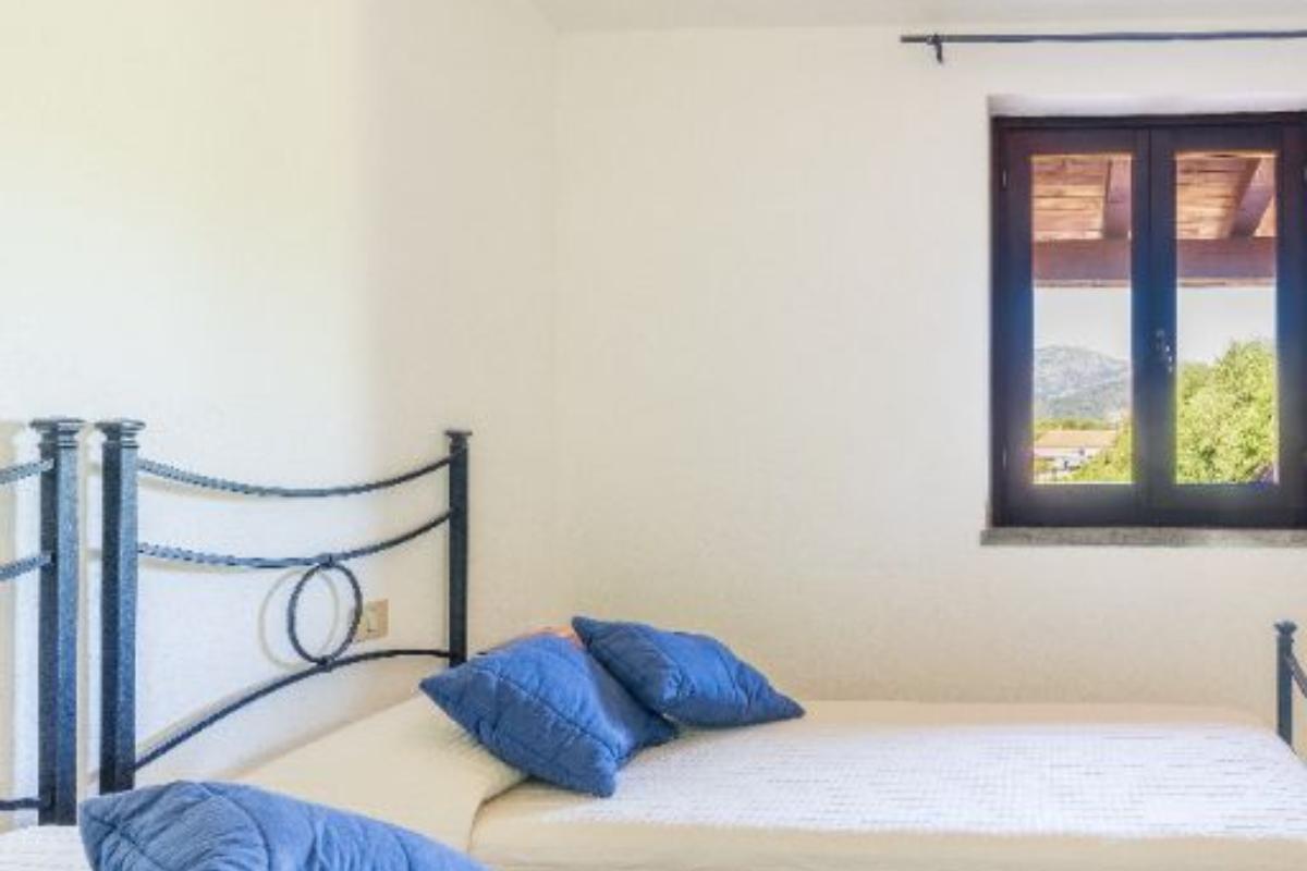 Nexus Hotels di Bini Viaggi S.R.L. Residence Oasi e Oasi Blu San Teodoro - Sistemazione Trilo 6 BLU 1