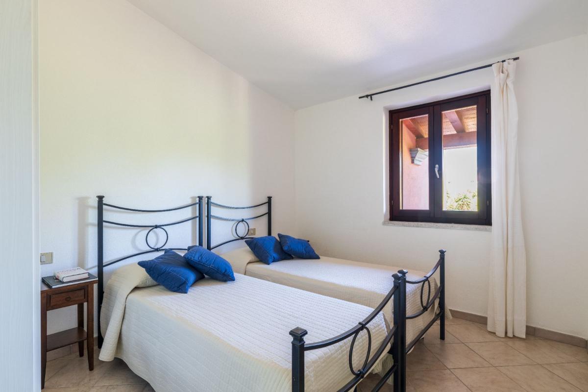 Nexus Hotels di Bini Viaggi S.R.L. Residence Oasi e Oasi Blu San Teodoro -  Sistemazione Trilo 6 BLU 1