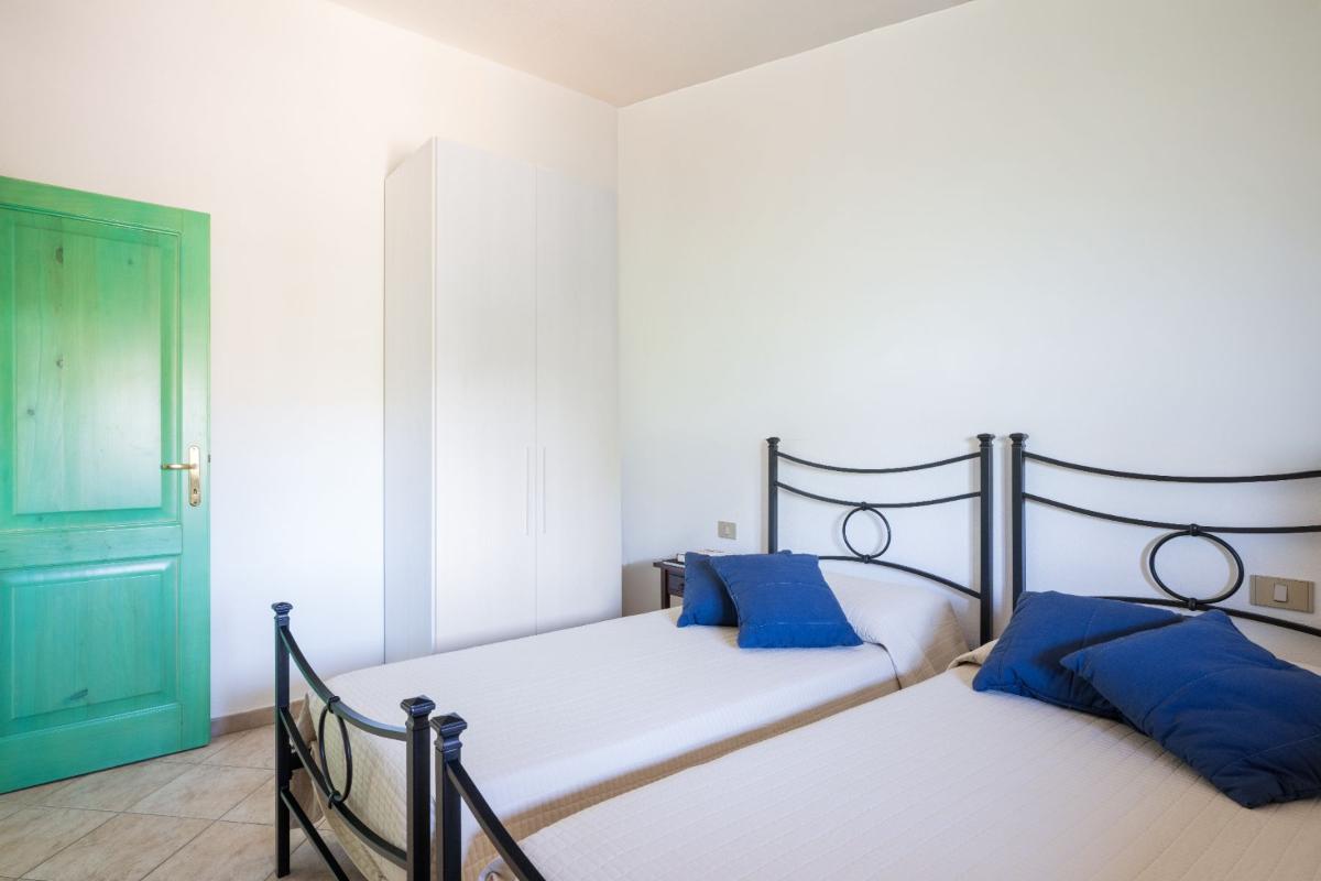 Nexus Hotels di Bini Viaggi S.R.L. Residence Oasi e Oasi Blu San Teodoro -  Sistemazione Trilo 6 BLU 1