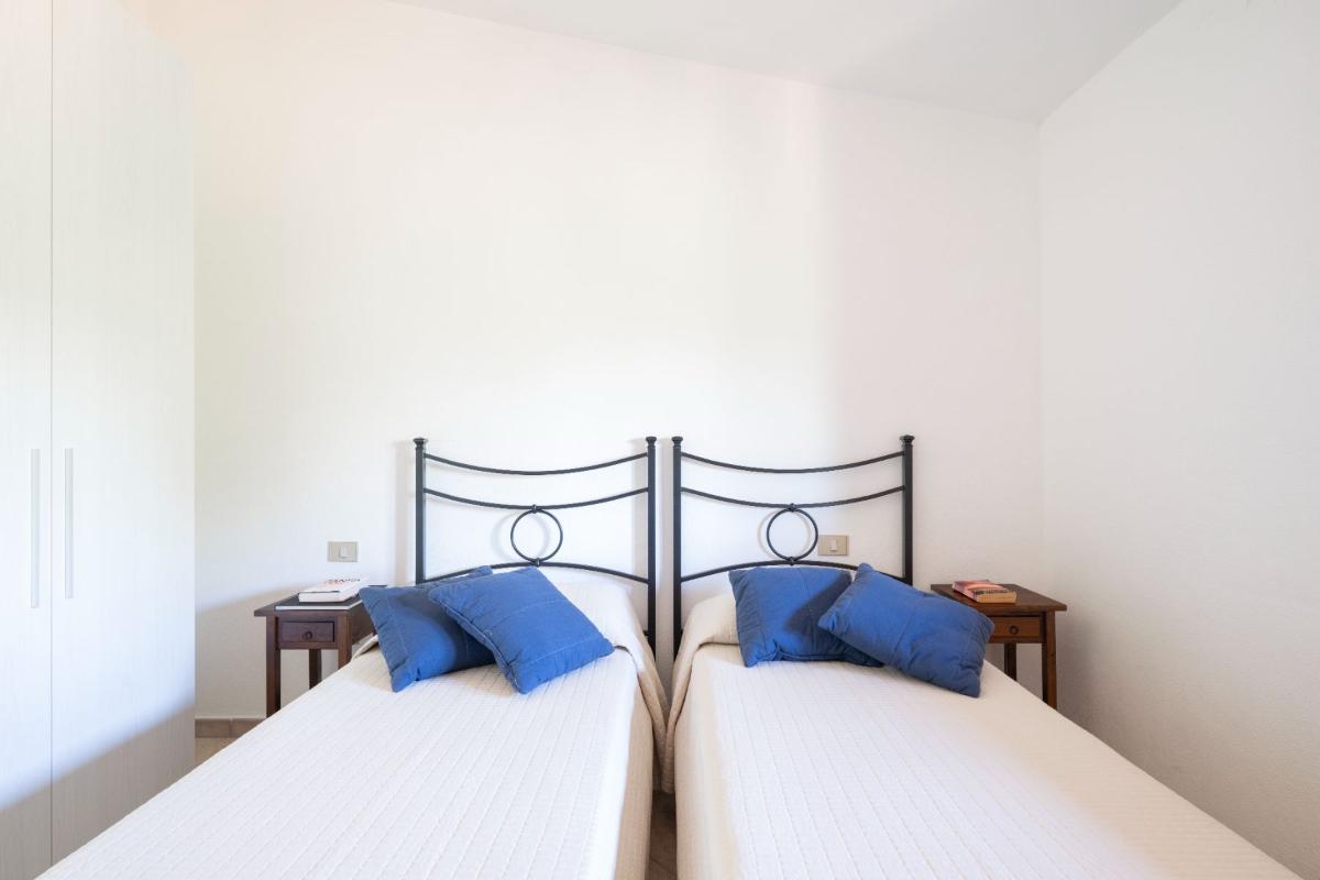 Nexus Hotels di Bini Viaggi S.R.L. Residence Oasi e Oasi Blu San Teodoro -  Sistemazione Trilo 6 BLU 1