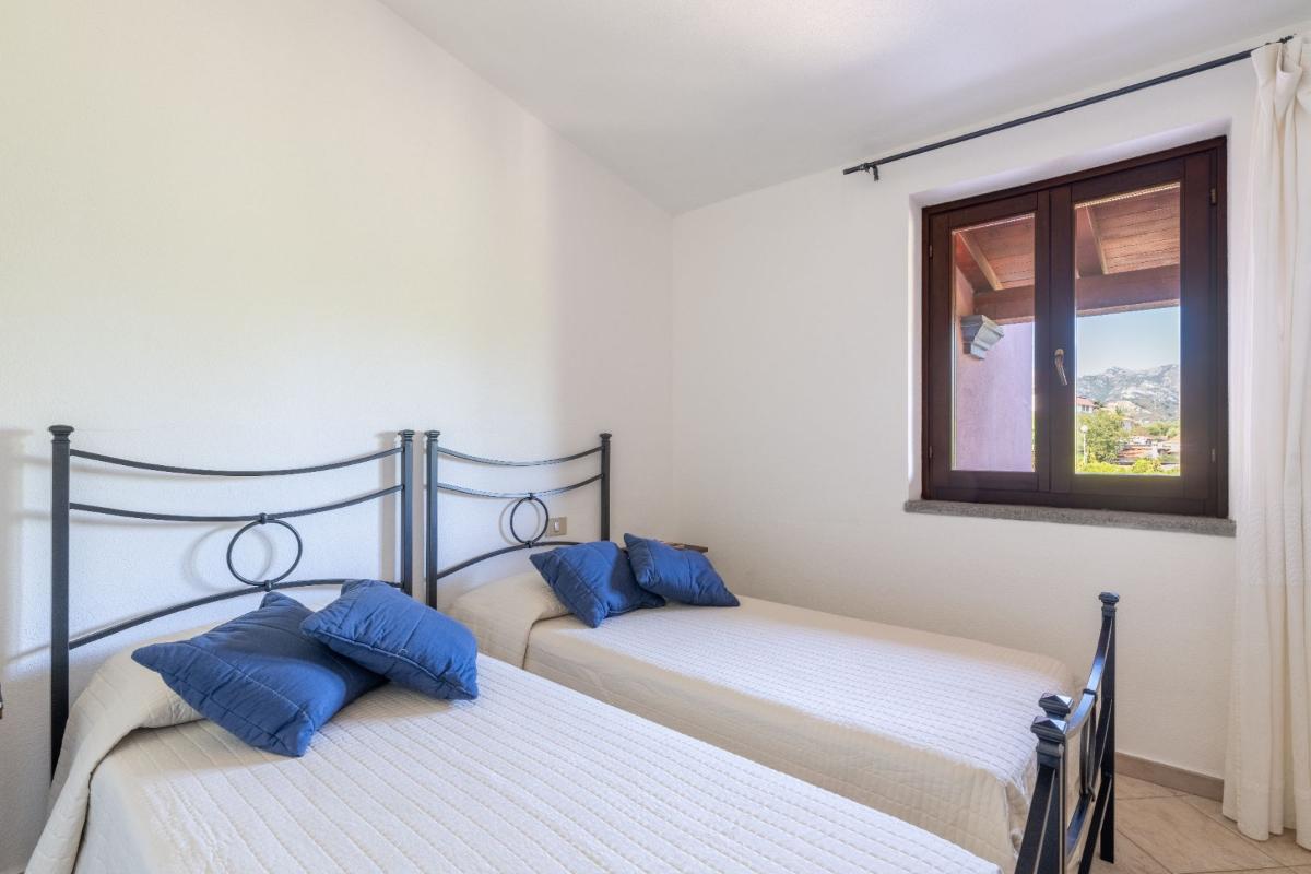 Nexus Hotels di Bini Viaggi S.R.L. Residence Oasi e Oasi Blu San Teodoro -  Sistemazione Trilo 6 BLU 1