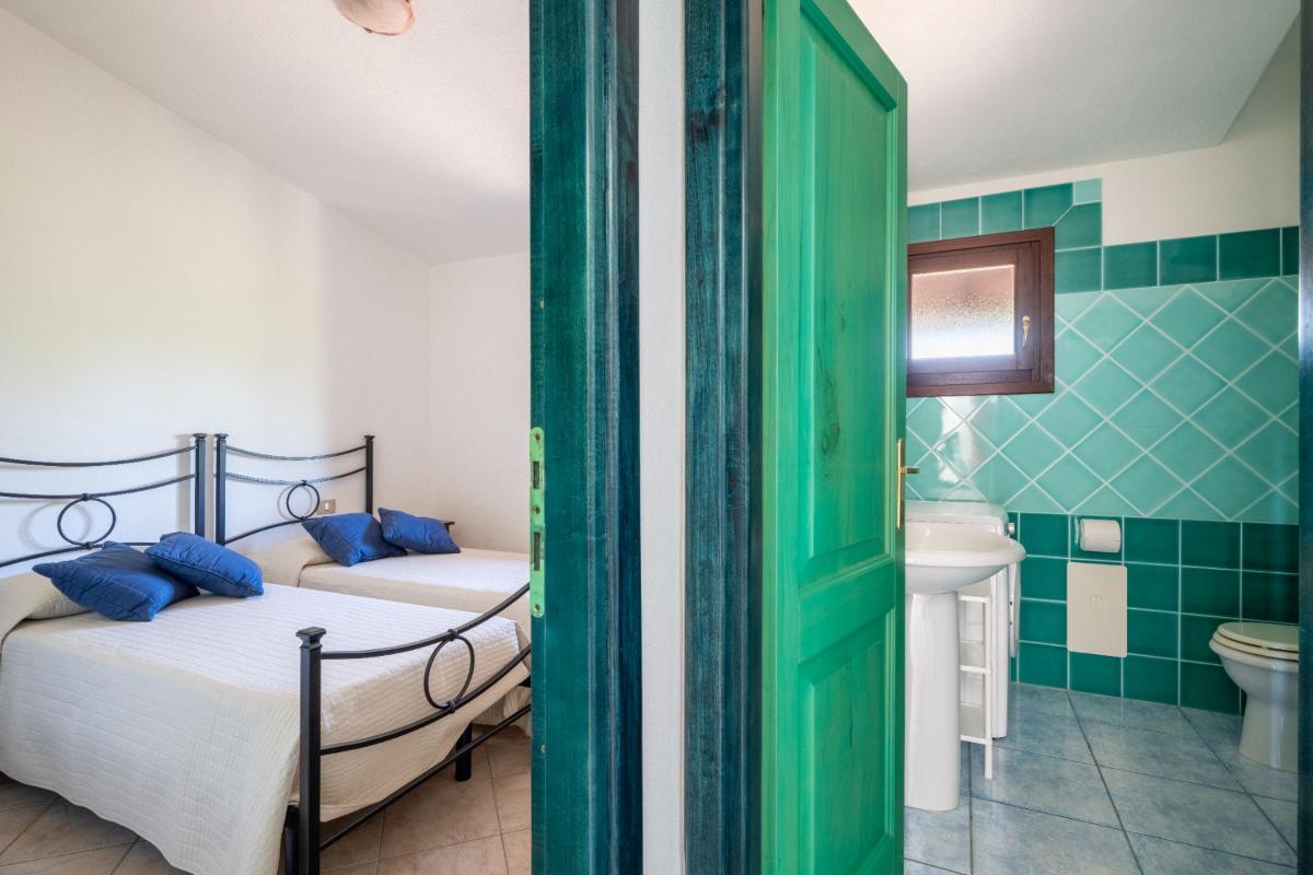 Nexus Hotels di Bini Viaggi S.R.L. Residence Oasi e Oasi Blu San Teodoro -  Sistemazione Trilo 6 BLU 1