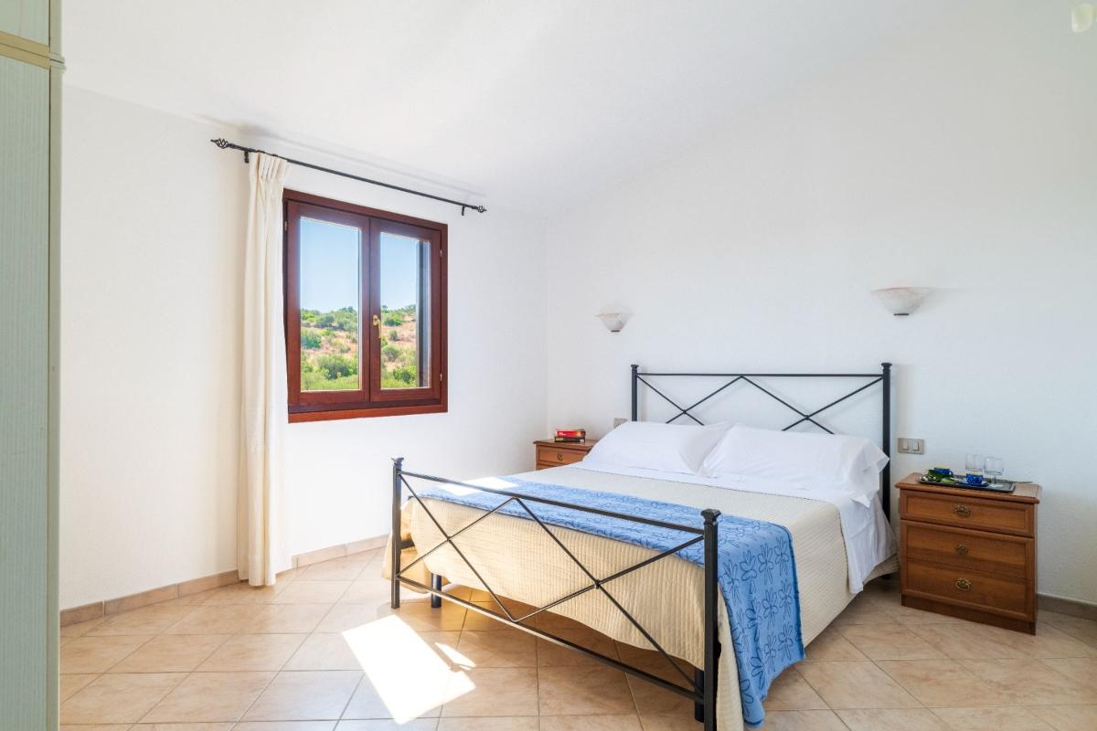 Nexus Hotels di Bini Viaggi S.R.L. Residence Oasi e Oasi Blu San Teodoro -  Sistemazione Trilo 6 BLU 1