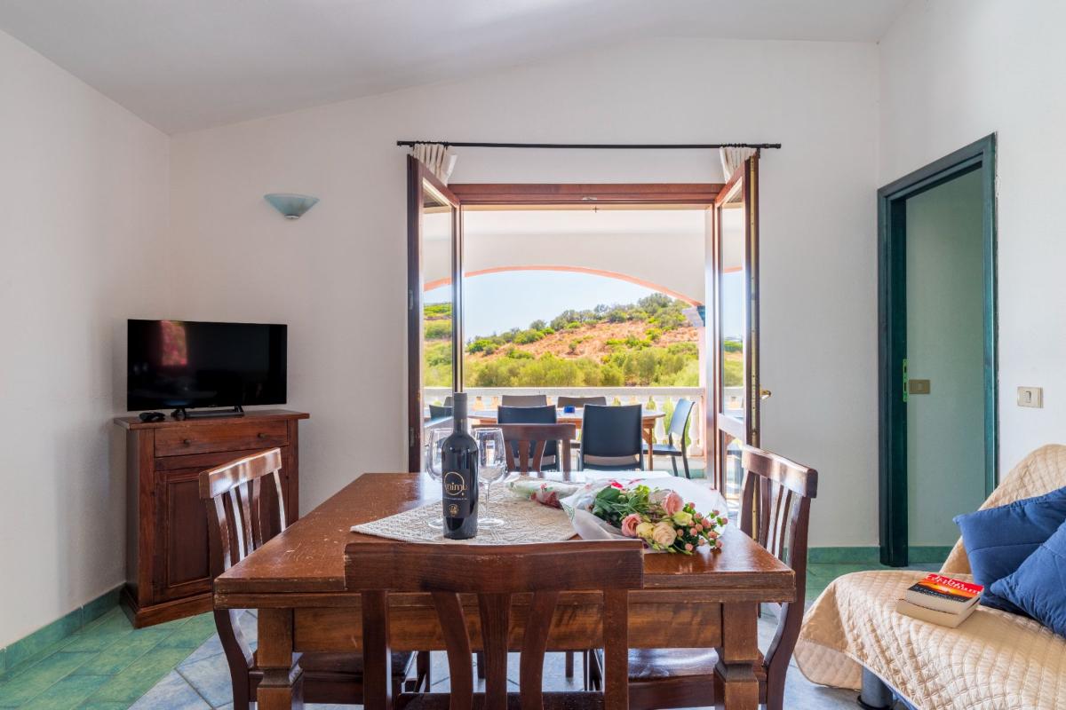 Nexus Hotels di Bini Viaggi S.R.L. Residence Oasi e Oasi Blu San Teodoro -  Sistemazione Trilo 6 BLU 1