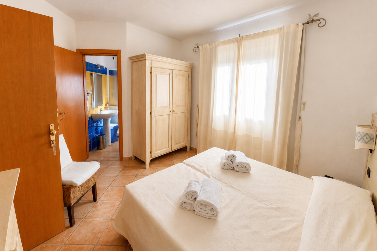 Nexus Hotels di Bini Viaggi S.R.L. Hotel Il Faro di Molara Porto San Paolo -  Sistemazione Standard 1