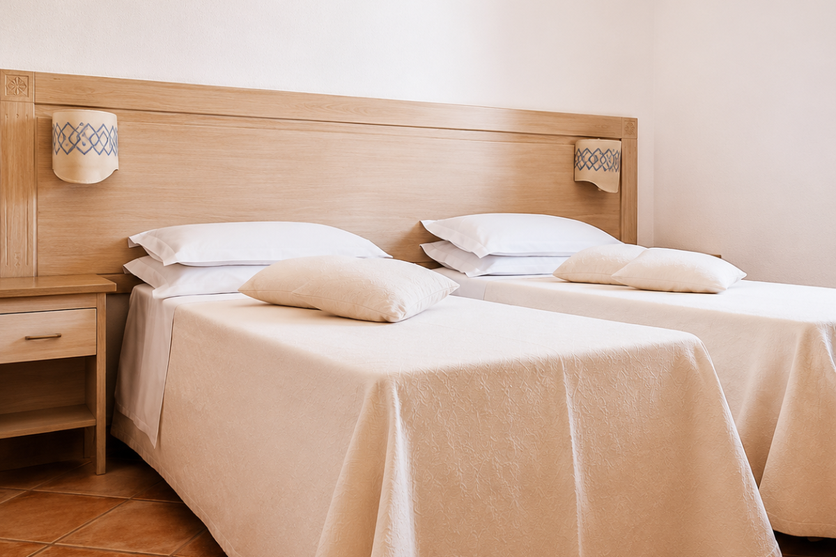 Nexus Hotels di Bini Viaggi S.R.L. Hotel Il Faro di Molara Porto San Paolo -  Sistemazione Standard 1