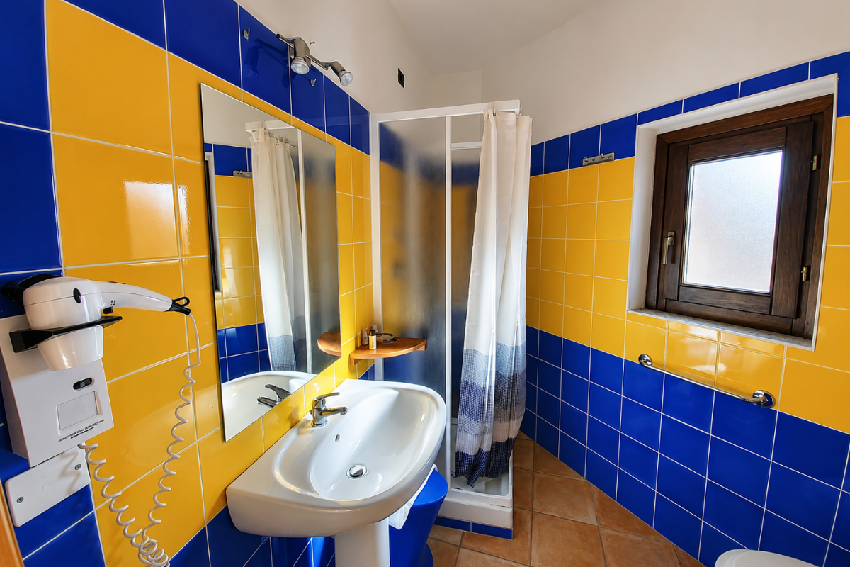 Nexus Hotels di Bini Viaggi S.R.L. Hotel Il Faro di Molara Porto San Paolo -  Sistemazione Standard 1