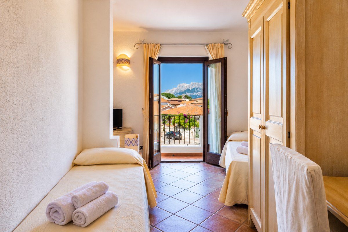 Nexus Hotels di Bini Viaggi S.R.L. Hotel Il Faro di Molara Porto San Paolo -  Sistemazione Comfort 1