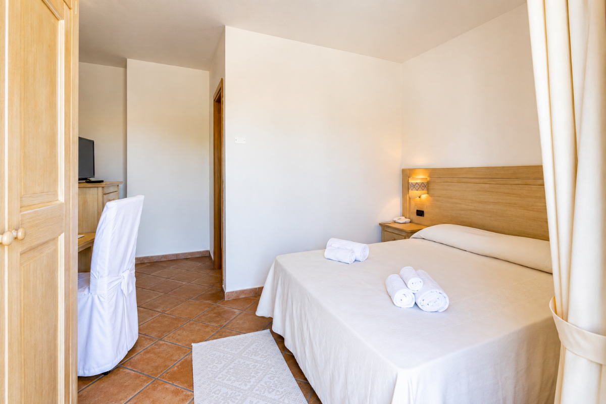 Nexus Hotels di Bini Viaggi S.R.L. Hotel Il Faro di Molara Porto San Paolo -  Sistemazione Comfort 1