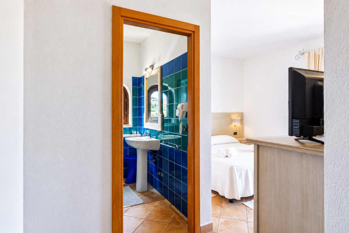 Nexus Hotels di Bini Viaggi S.R.L. Hotel Il Faro di Molara Porto San Paolo -  Sistemazione Comfort 1