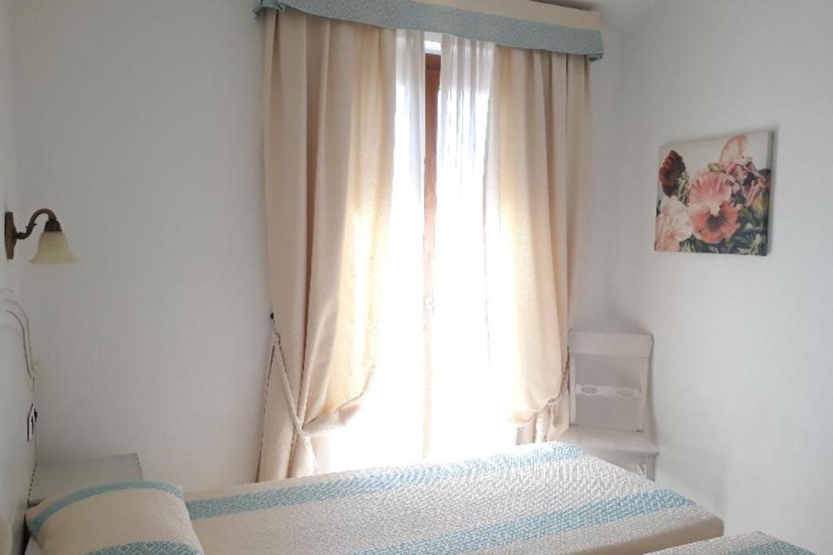 Nexus Hotels di Bini Viaggi S.R.L. Hotel Il Faro di Molara Porto San Paolo -  Sistemazione Zimmer im Dépendance 1