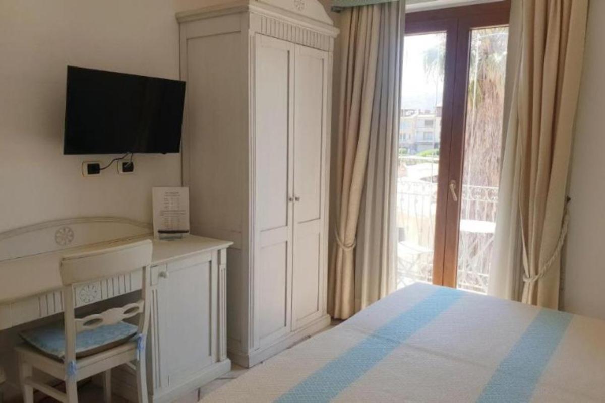Nexus Hotels di Bini Viaggi S.R.L. Hotel Il Faro di Molara Porto San Paolo -  Sistemazione Zimmer im Dépendance 1