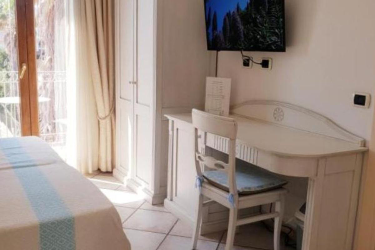 Nexus Hotels di Bini Viaggi S.R.L. Hotel Il Faro di Molara Porto San Paolo -  Sistemazione Zimmer im Dépendance 1