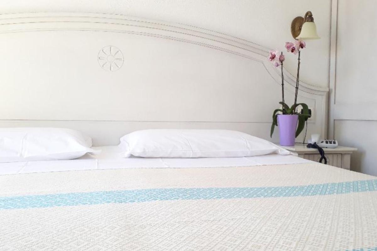 Nexus Hotels di Bini Viaggi S.R.L. Hotel Il Faro di Molara Porto San Paolo -  Sistemazione Zimmer im Dépendance 1