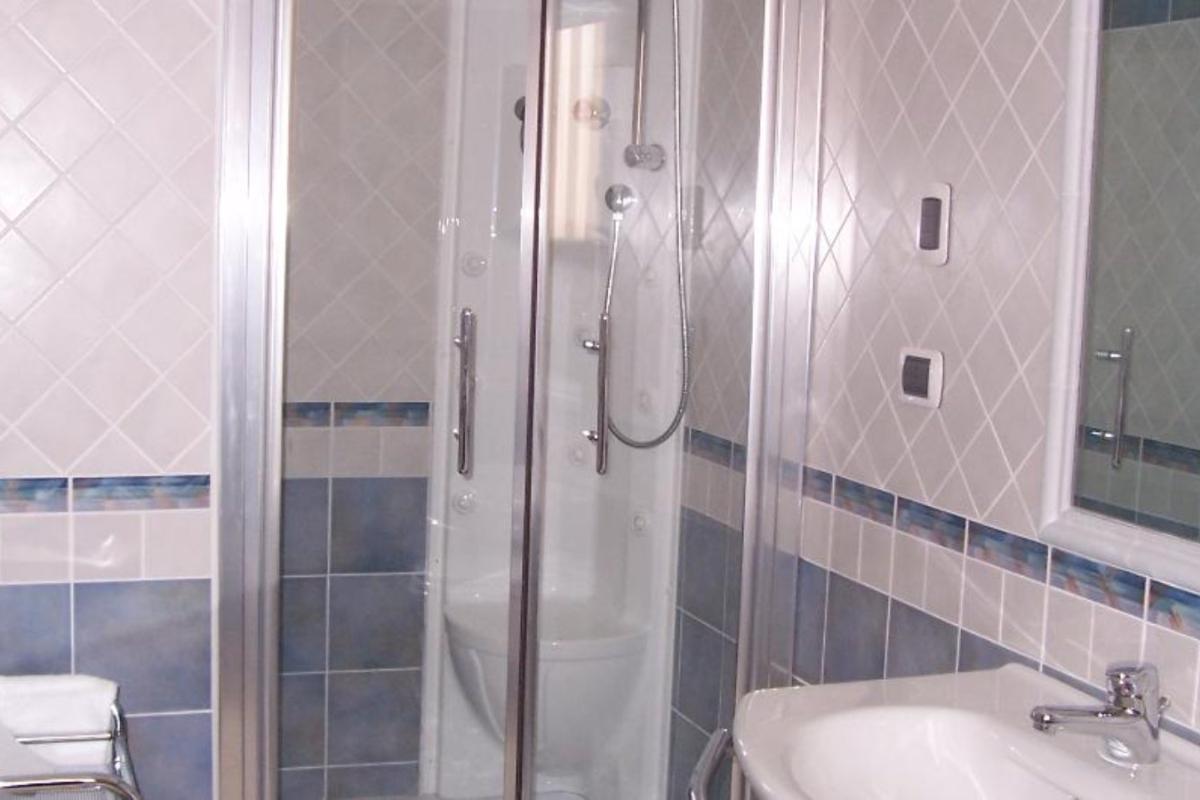 Nexus Hotels di Bini Viaggi S.R.L. Hotel Il Faro di Molara Porto San Paolo -  Sistemazione Zimmer im Dépendance 1