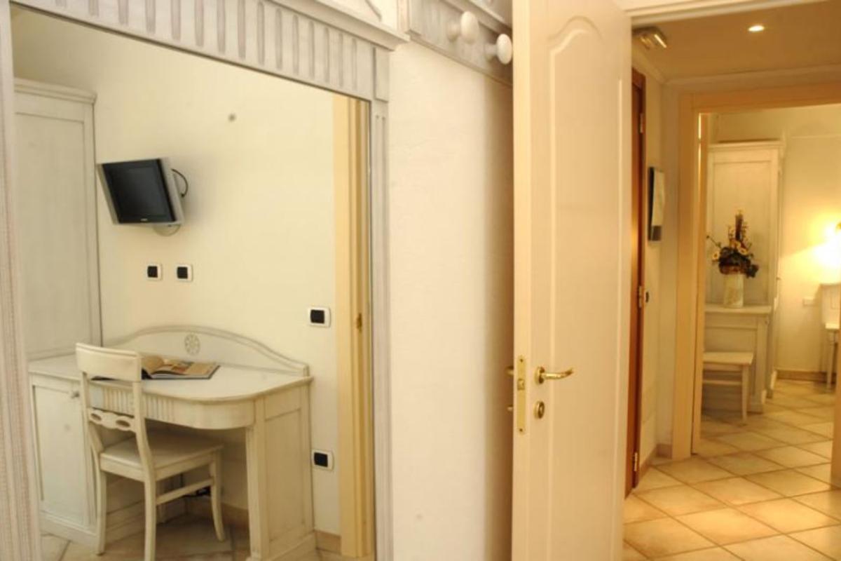 Nexus Hotels di Bini Viaggi S.R.L. Hotel Il Faro di Molara Porto San Paolo -  Sistemazione Zimmer im Dépendance 1