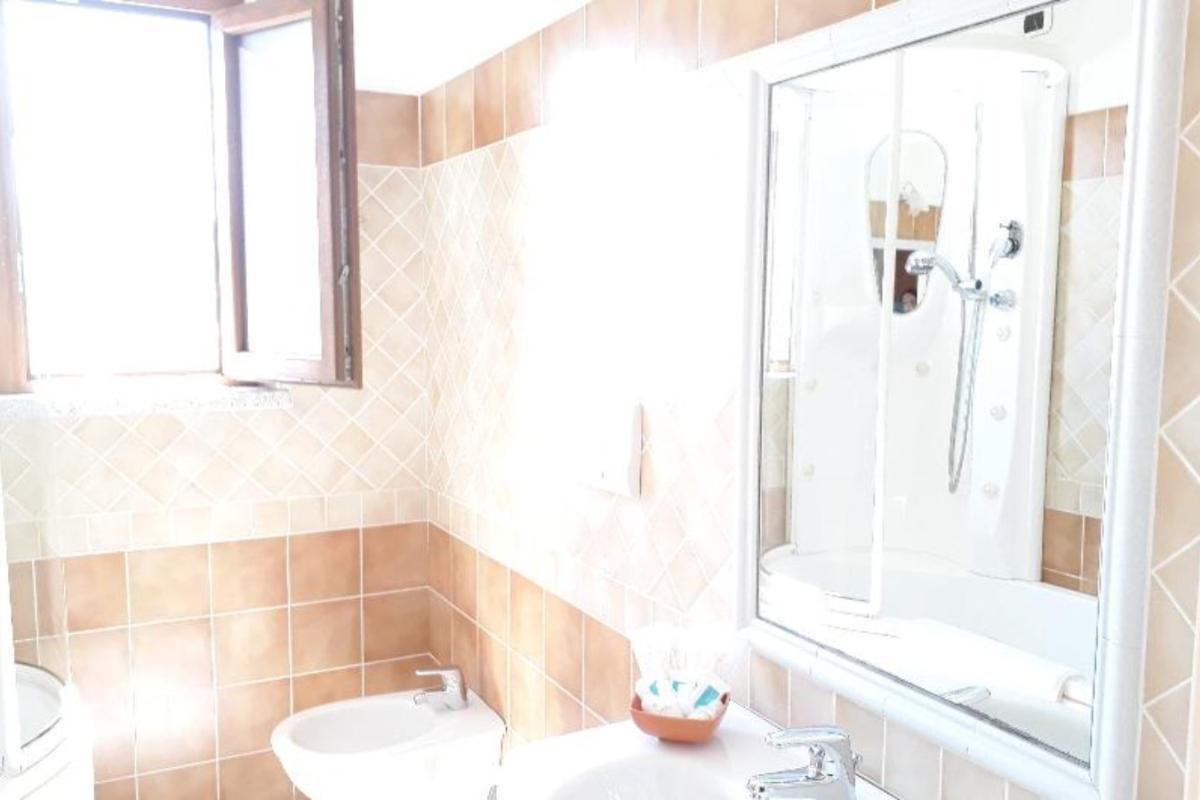Nexus Hotels di Bini Viaggi S.R.L. Hotel Il Faro di Molara Porto San Paolo -  Sistemazione Zimmer im Dépendance 1