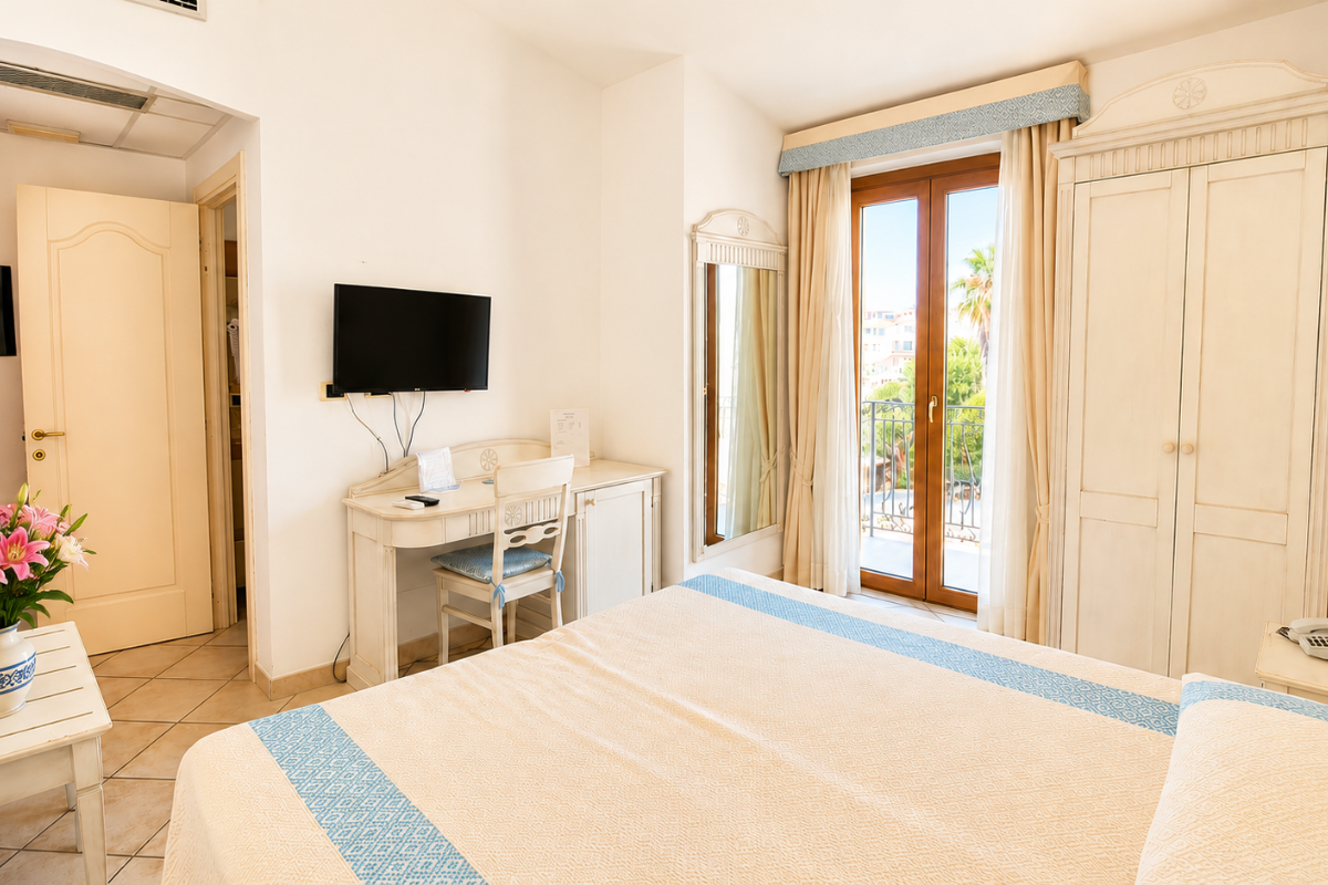 Nexus Hotels di Bini Viaggi S.R.L. Hotel Il Faro di Molara Porto San Paolo -  Sistemazione Room in the Dépendance 1