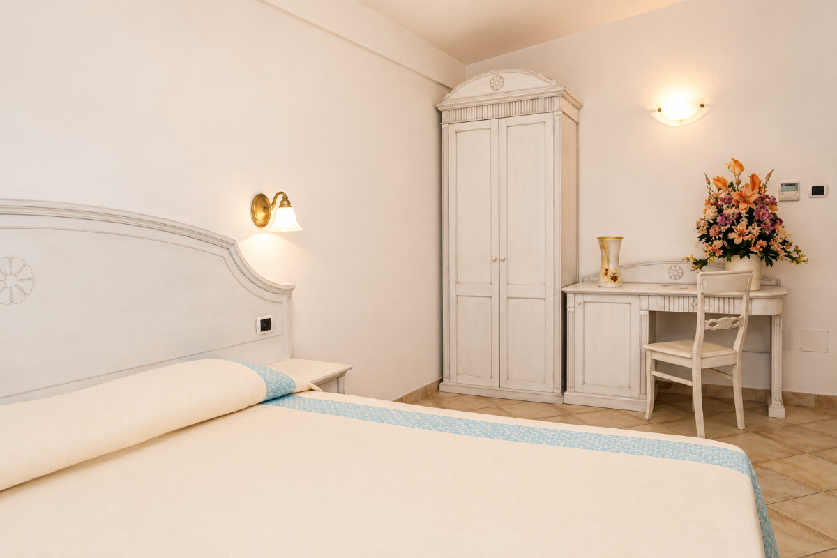 Nexus Hotels di Bini Viaggi S.R.L. Hotel Il Faro di Molara Porto San Paolo -  Sistemazione Room in the Dépendance 1