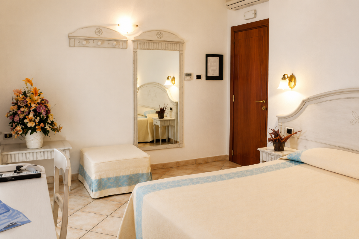 Nexus Hotels di Bini Viaggi S.R.L. Hotel Il Faro di Molara Porto San Paolo -  Sistemazione Room in the Dépendance 1