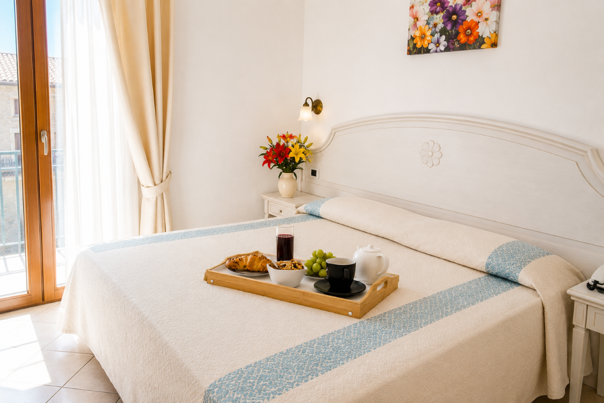 Nexus Hotels di Bini Viaggi S.R.L. Hotel Il Faro di Molara Porto San Paolo -  Sistemazione Room in the Dépendance 1