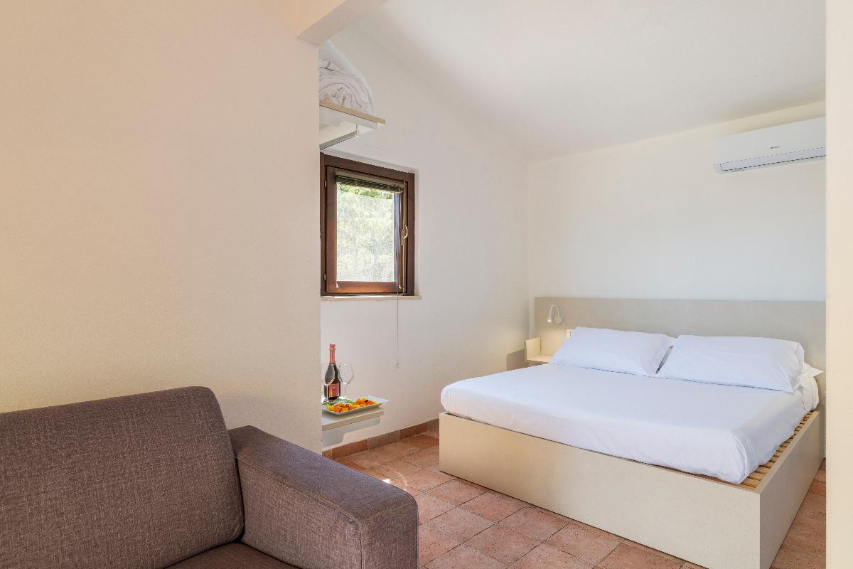 Nexus Hotels di Bini Viaggi S.R.L. Q Resort Platamona -  Sistemazione Chambre Supérieure 1