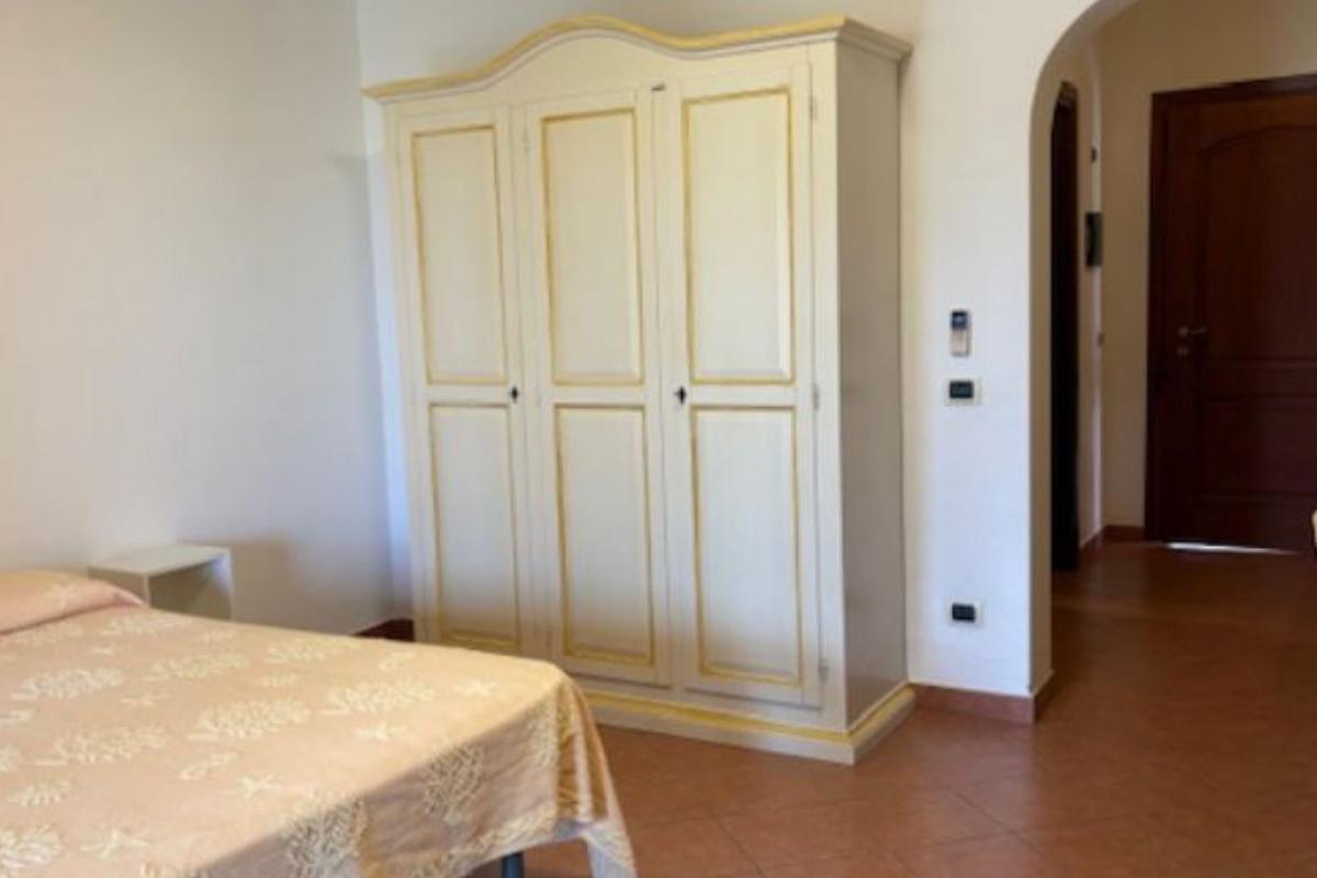 Nexus Hotels di Bini Viaggi S.R.L.  Golfo di Marinella -  Sistemazione Trilo 6 - Dos Baños 1