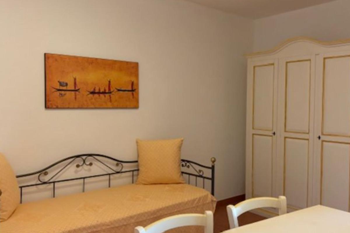 Nexus Hotels di Bini Viaggi S.R.L.  Golfo di Marinella -  Sistemazione Trilo 6 - Dos Baños 1