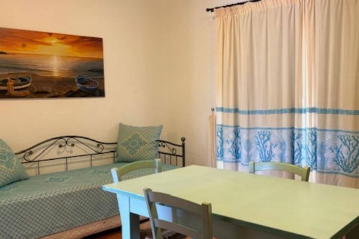 Nexus Hotels di Bini Viaggi S.R.L.  Golfo di Marinella -  Sistemazione Trilo 6 - Dos Baños 1