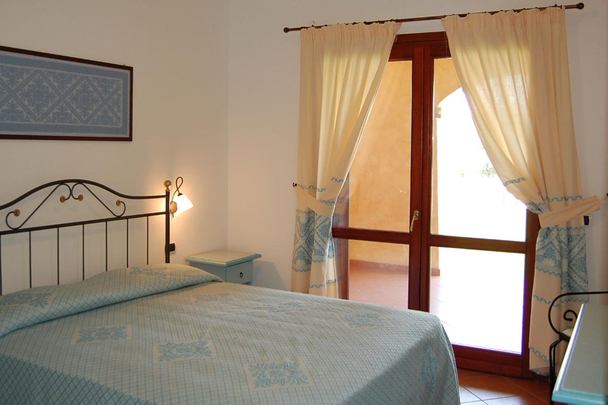 Nexus Hotels di Bini Viaggi S.R.L.  Golfo di Marinella -  Sistemazione Trilo 6 - Dos Baños 1