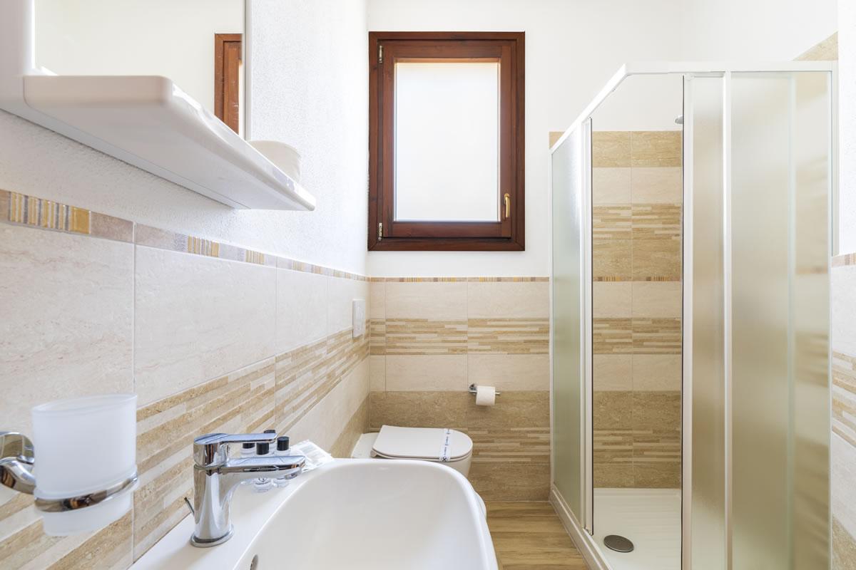 Nexus Hotels di Bini Viaggi S.R.L. Residence Baia Santa Reparata Santa Teresa Gallura -  Sistemazione Trilo 4 - Doppi Servizi 1