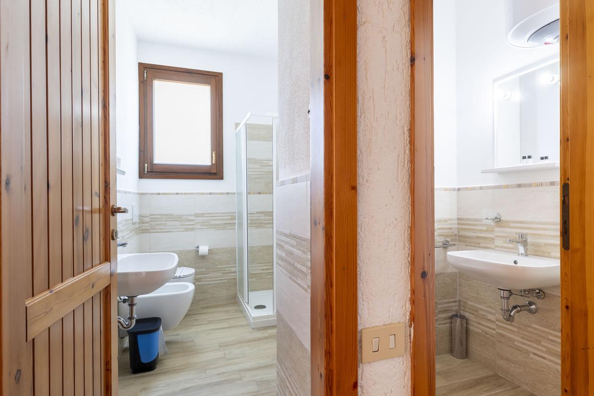 Nexus Hotels di Bini Viaggi S.R.L. Residence Baia Santa Reparata Santa Teresa Gallura -  Sistemazione Trilo 4 - Doppi Servizi 1