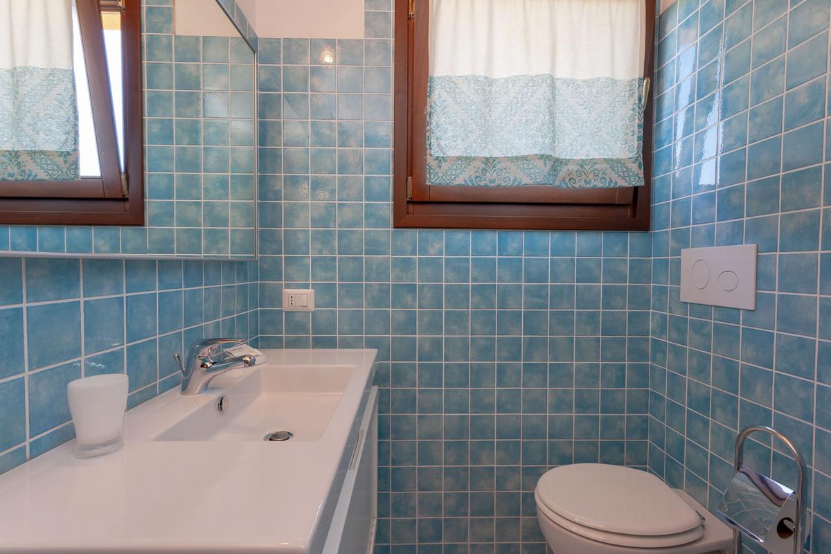 Residenze Pettirosso Pettirosso Center San Teodoro -  Camera Camera Tripla Deluxe 1