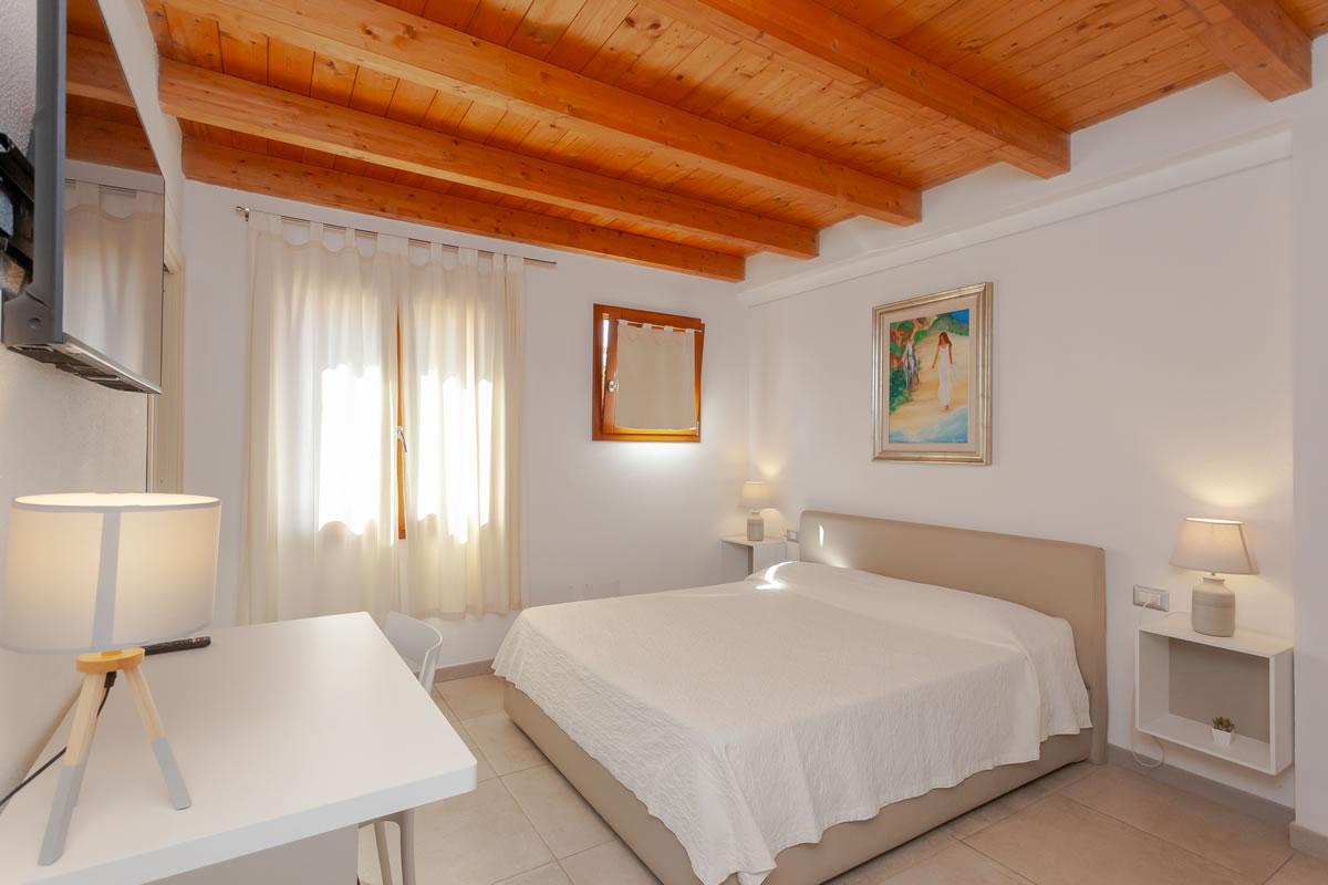 Residenze Pettirosso Pettirosso Center San Teodoro -  Camera Camera Deluxe 1